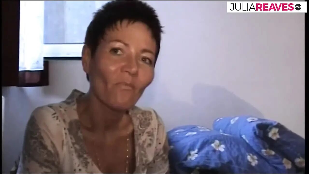 Mature brunette does it to herself after showering