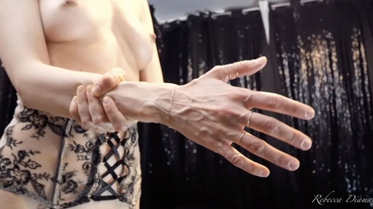 Rebecca Diamante Shows Her Hands' Veins in Topless