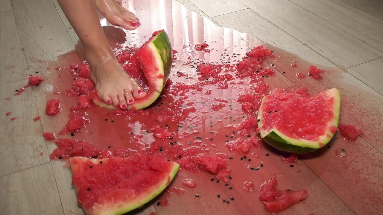 Busty MILF Presents Her Feet and Plays with a Watermelon