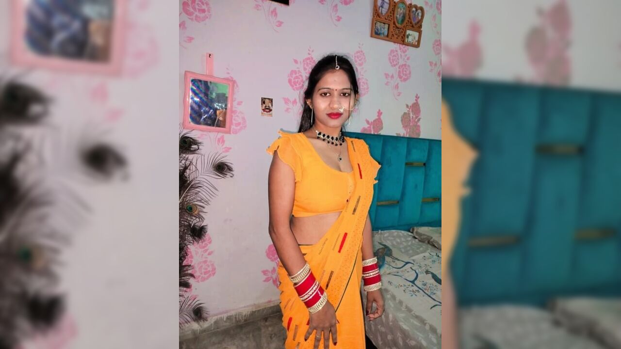 Desi Indian bhabhi in yellow saree looking hot and sexy
