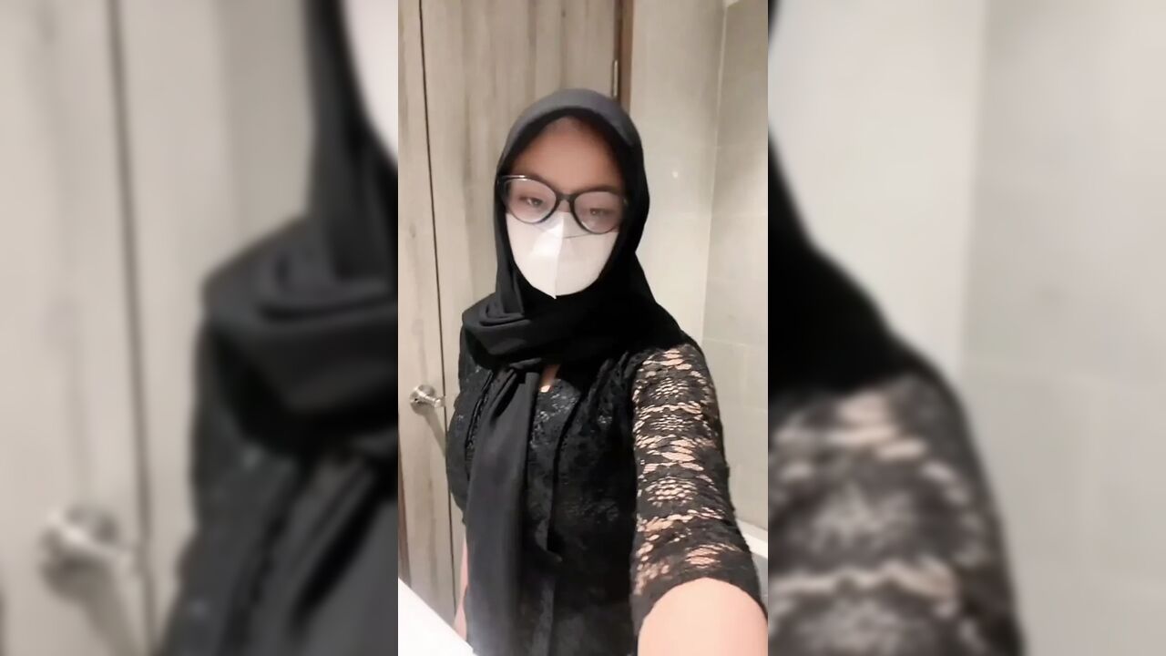 Sexy kebaya hijab playing in the toilet