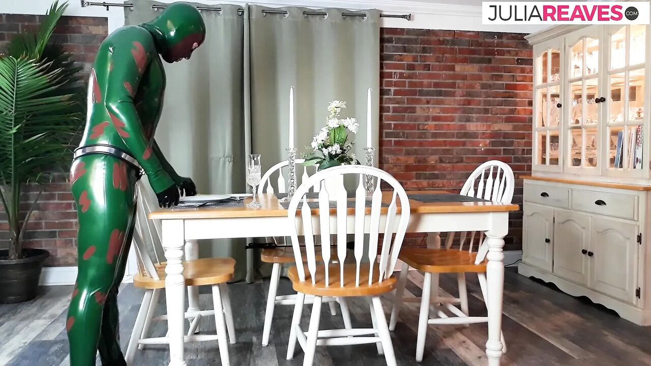 Ass whipping in a full body latex suit