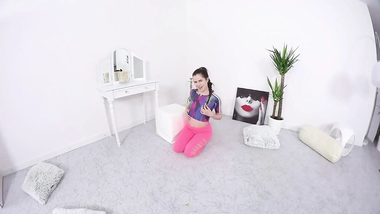 Teen gymnast stretching