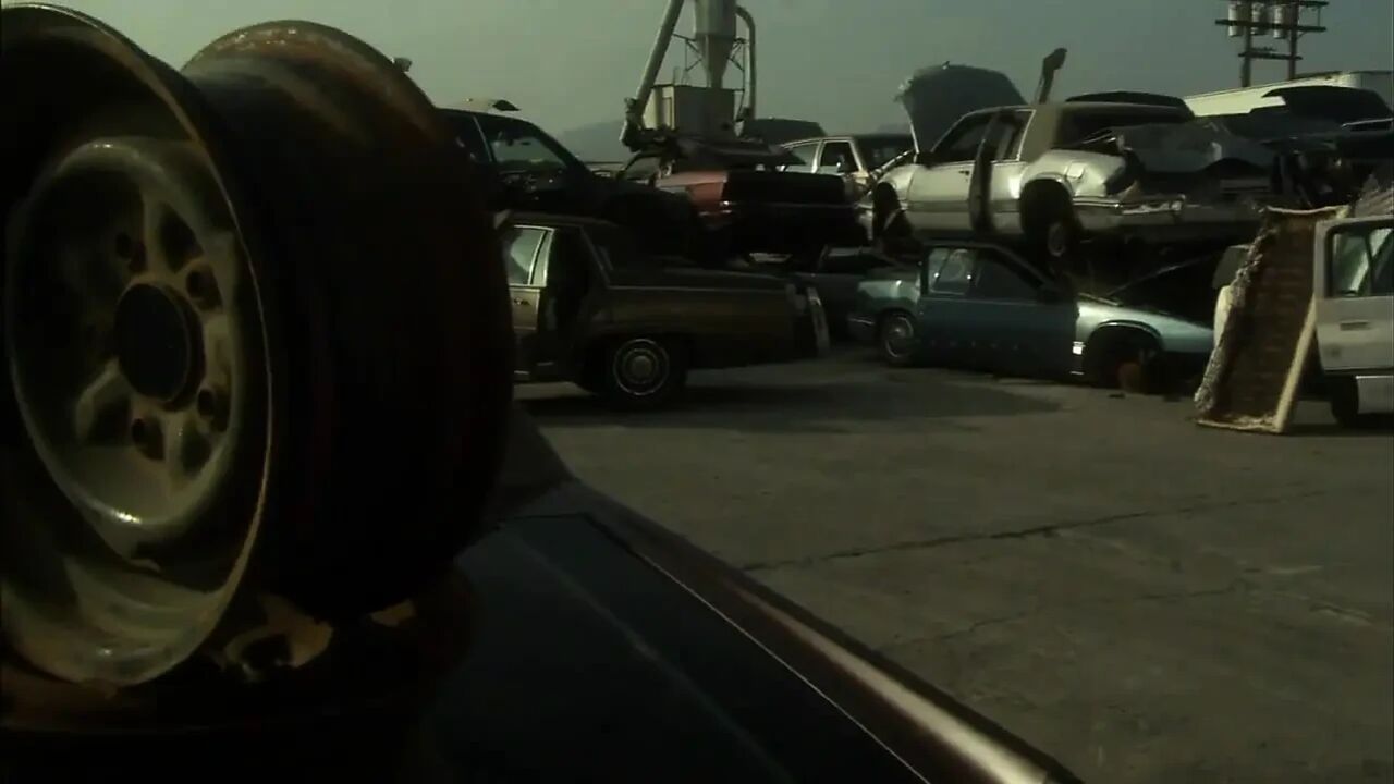 Hot sexual moment in a car demolition...