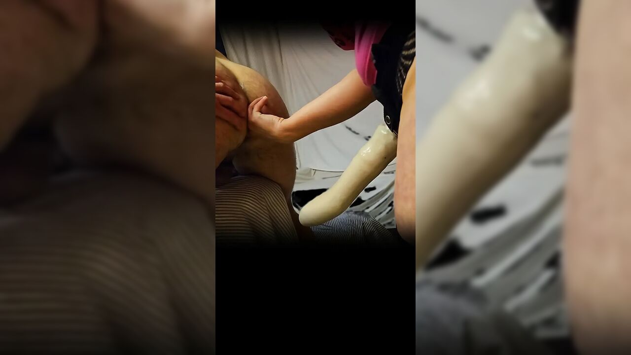 She fucks her boyfriend deep in his ass with a big dildo strapon