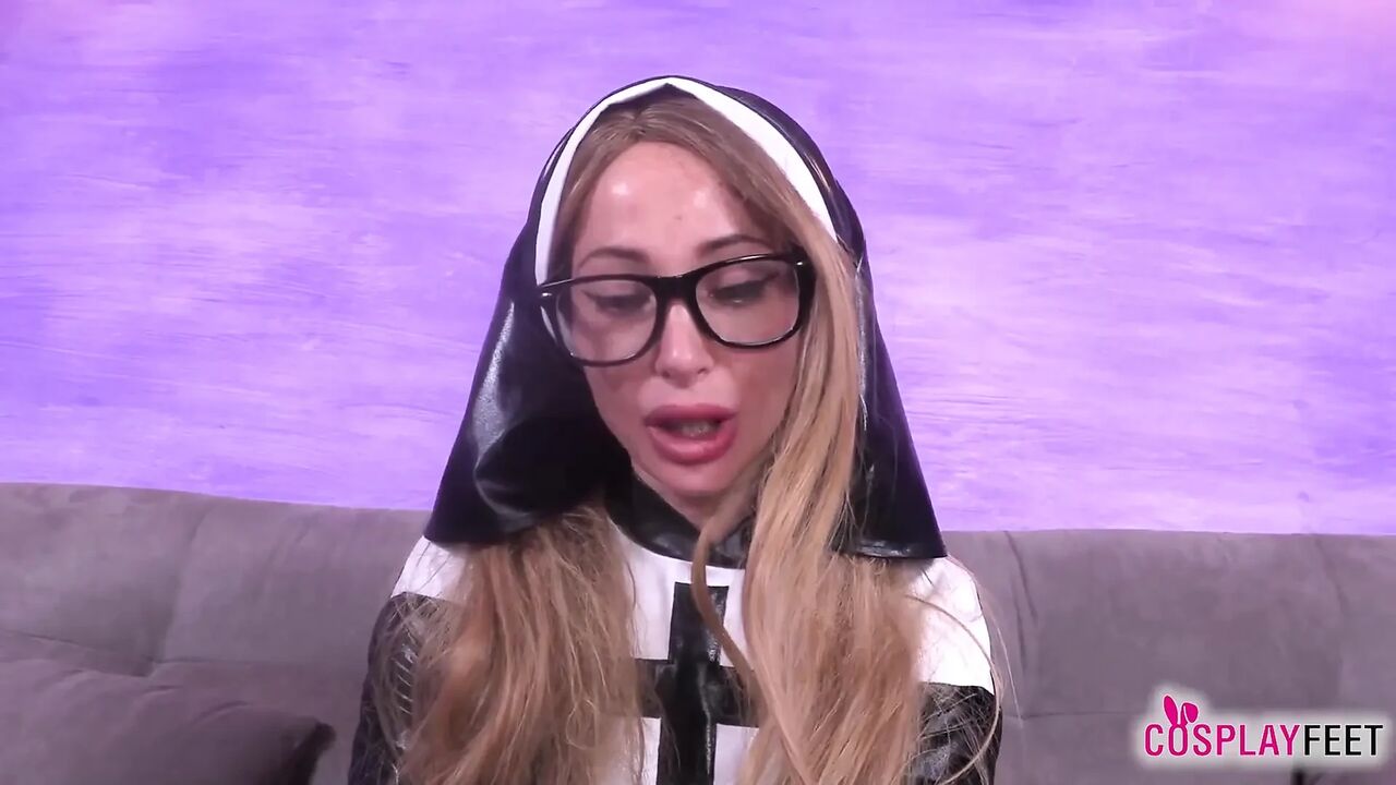 Blonde Bombshell Ania as a Sexy Nun in Black Stockings