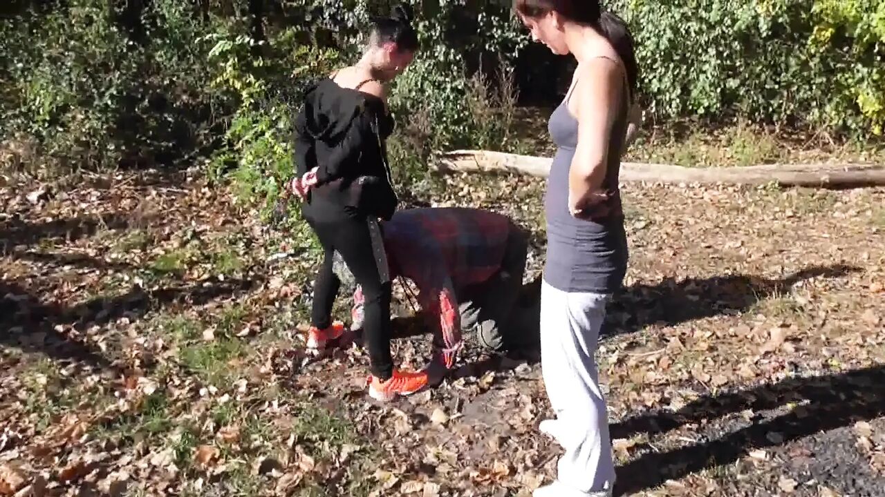 Dominant joggers walking their pet slave