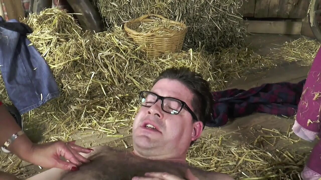 big boobed MILF has her fuck session in the barn