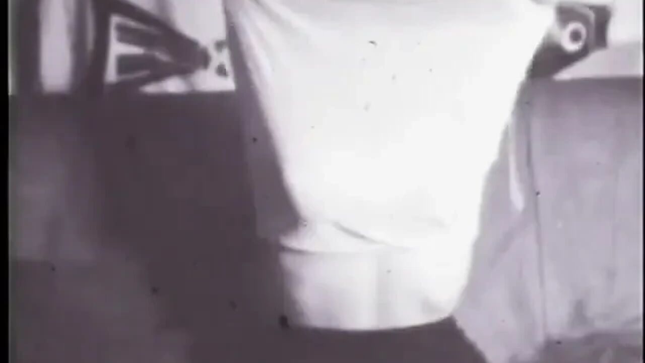 Strip-tease of a blonde woman in the sixties