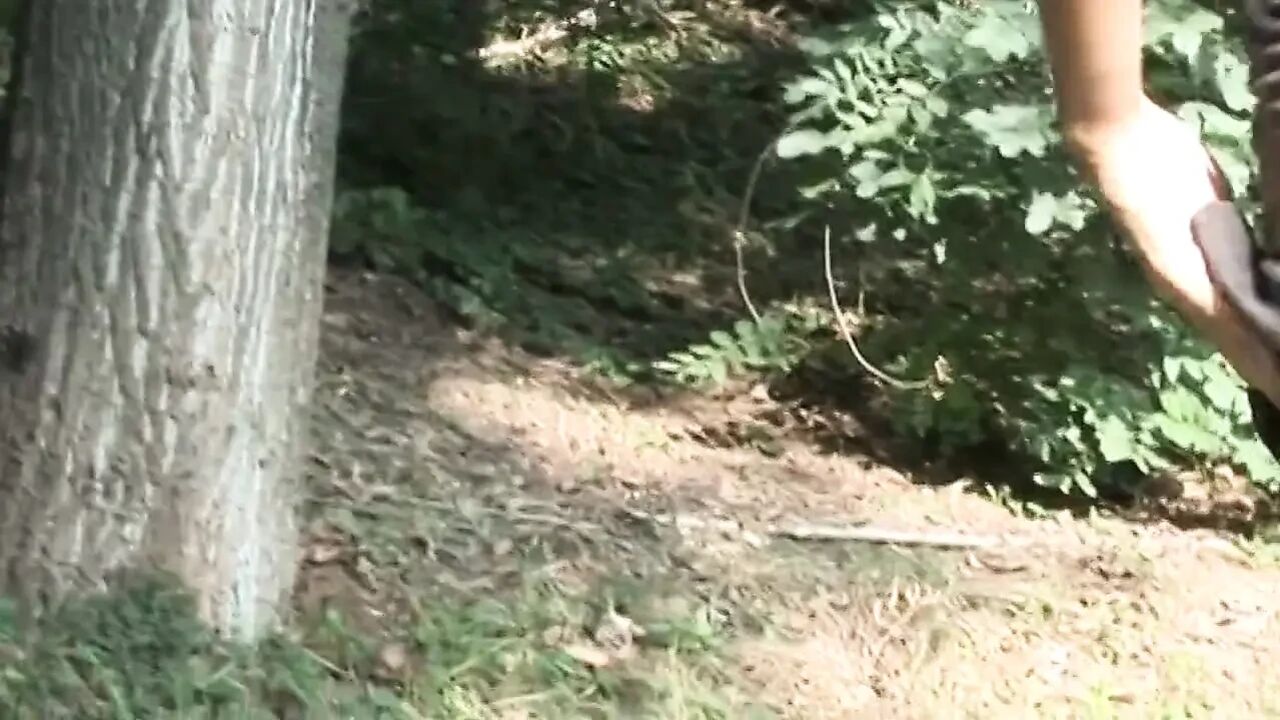 Hot redhead slut shows her pussy outdoors