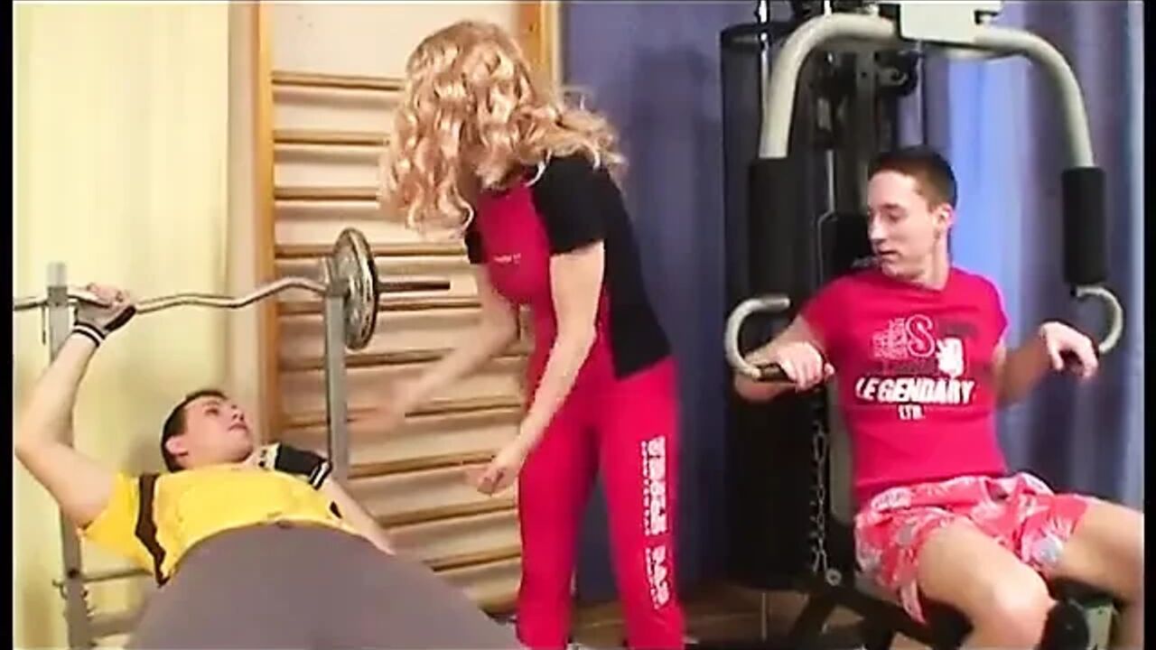 Slutty MILF Screwed in a Gym by Two Boys