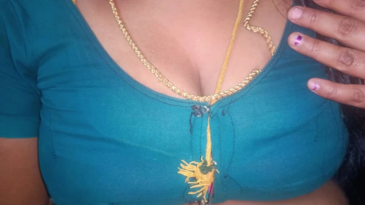 Tamil aunty squeezing her breasts when she is alone and unable to control her emotions.
