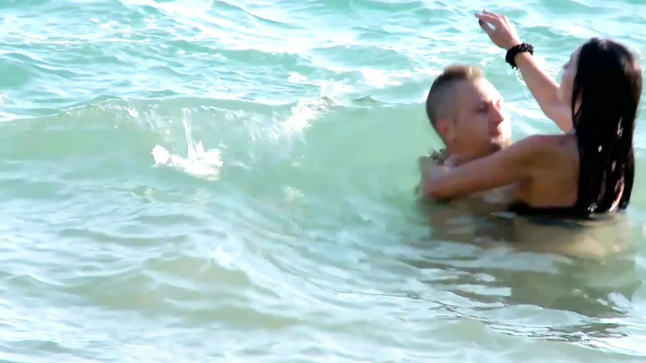 Brunette slut gets fucked doggystyle on the beach