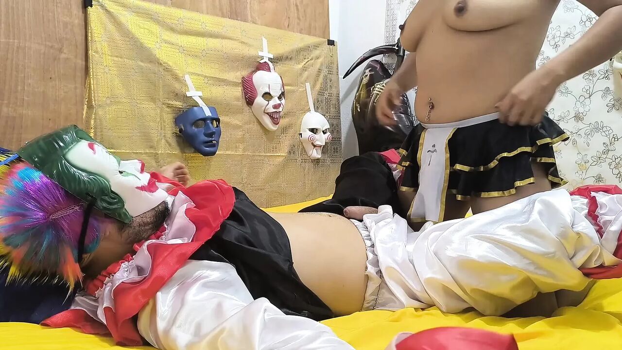A sexy clown appears in my bed and I start riding him on Halloween.