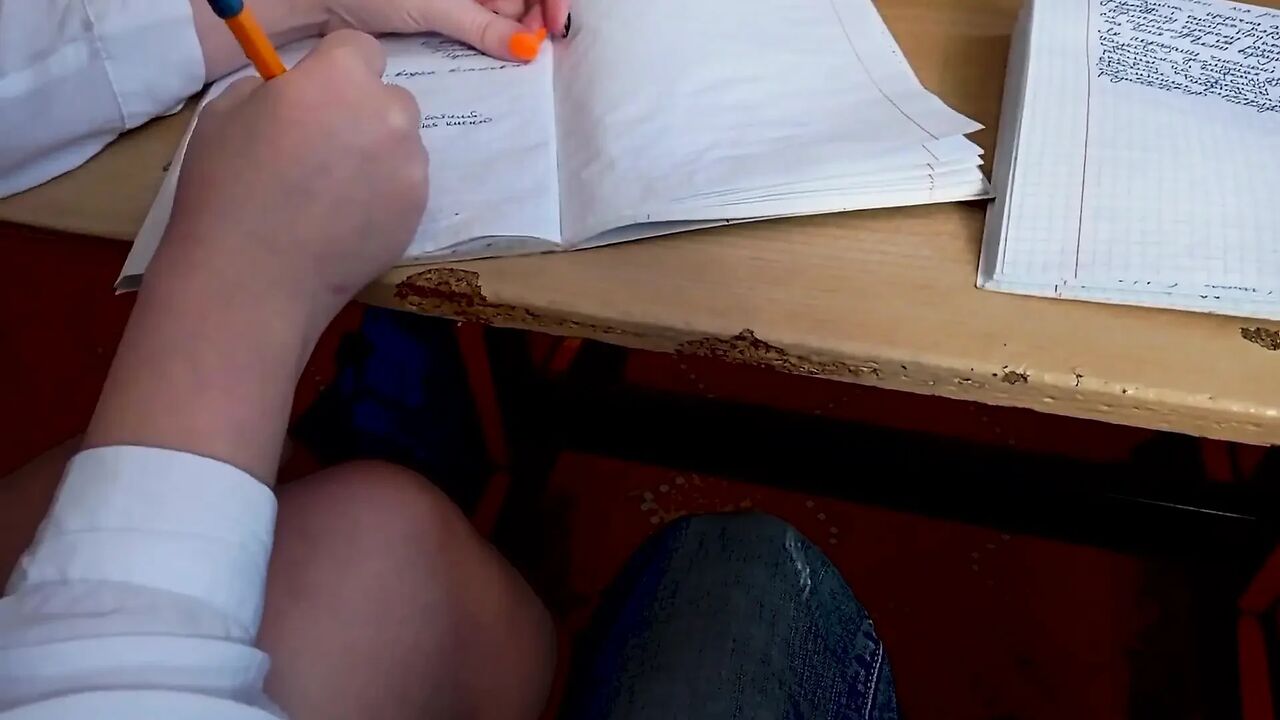 A classmate sucked a dick under a desk in a lesson