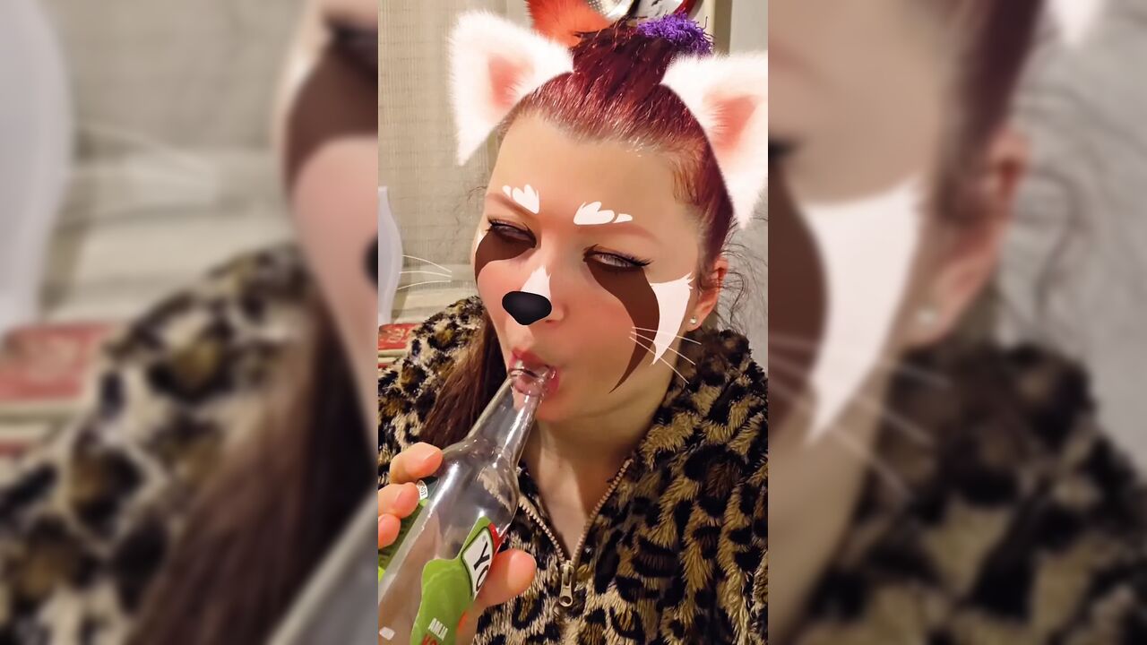 The perverted girl sucks a bottle...