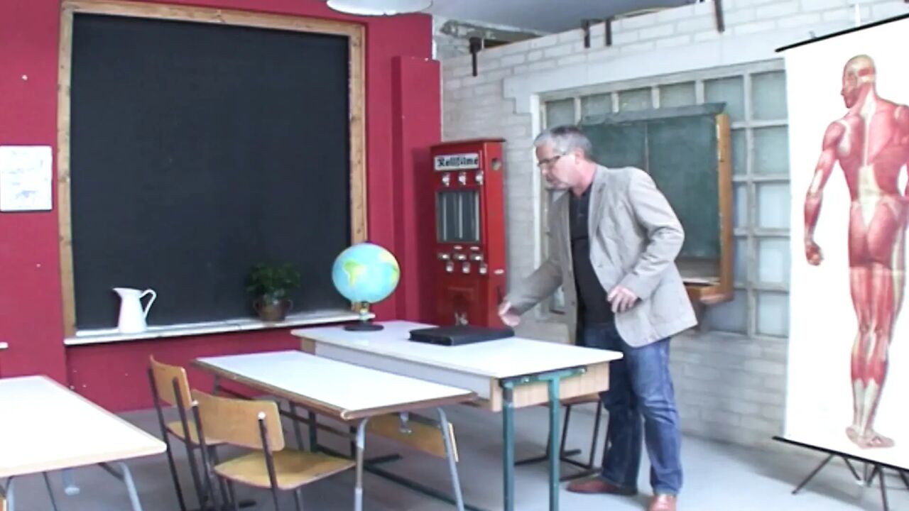 Attractive blonde German teen fucked in threesome in the classroom