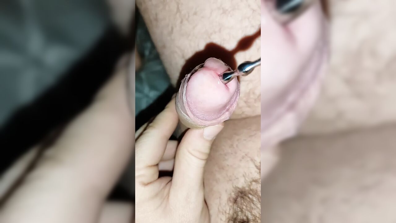A Large Dilator in My Stepbrother's Cock