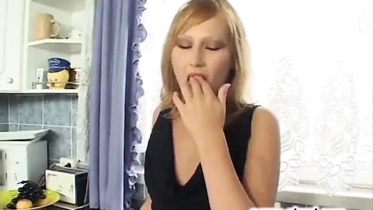 Hot blonde fingering her shaved cunt