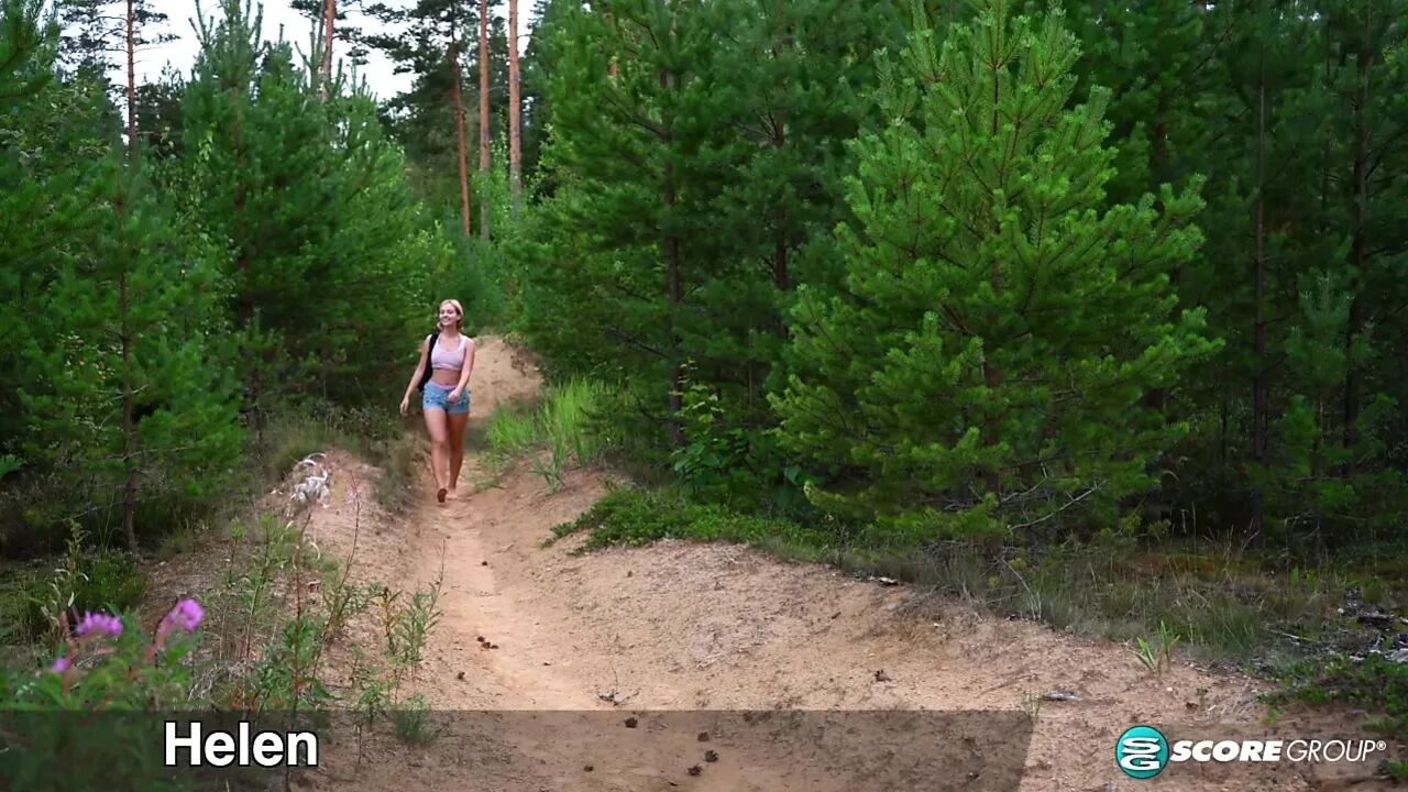 Horny Helen gets naked in the woods and fingers her bald