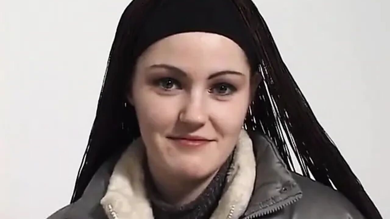 Young student takes off clothes to show body
