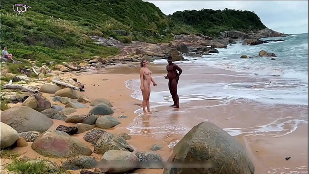 Couple on a nudist beach has sex outdoors with black man Marlon Costa - full video on RED