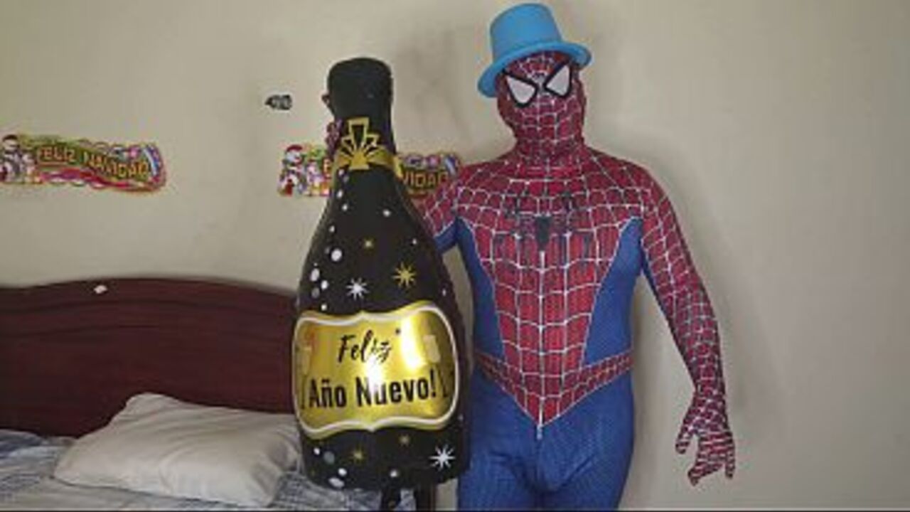 Beautiful big-bootied stepmother celebrates New Year's by sucking Spider-Man's dick