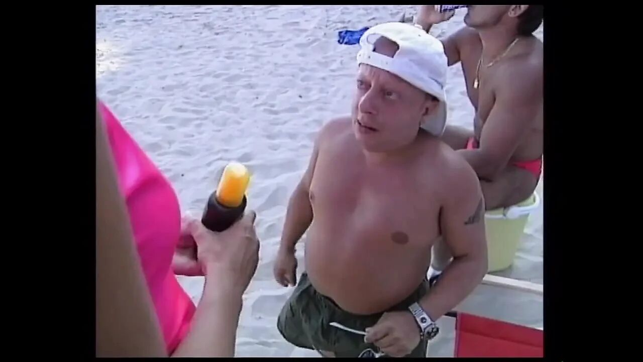 She Give a Nice Suck a Big Cock of His Friend While They Are in the Beach