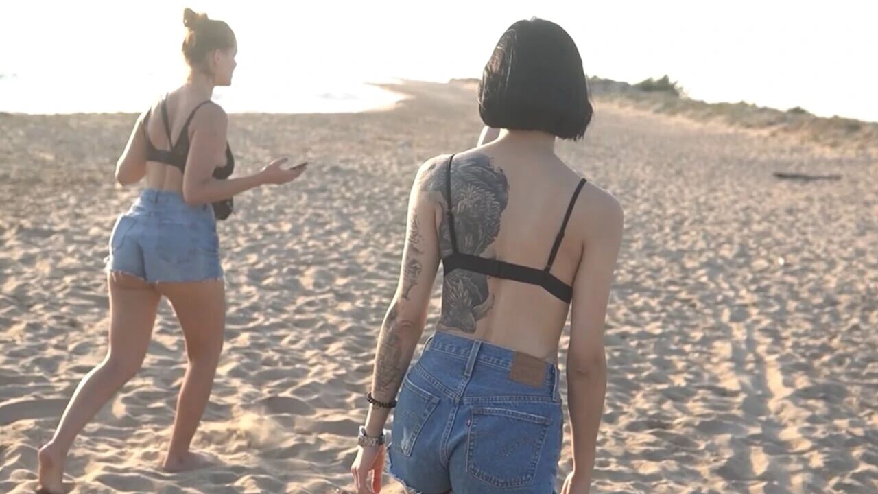 Join the girls for a sizzling game of Strip Volleyball