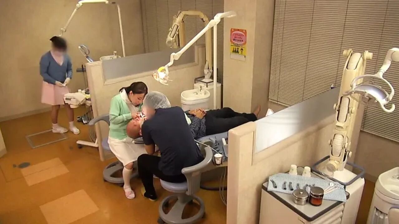 Elegant Dental Hygienist Leaning Close