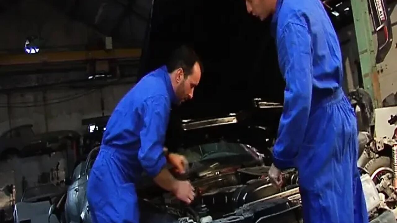 Attractive French babe double drilled in the mechanic garage