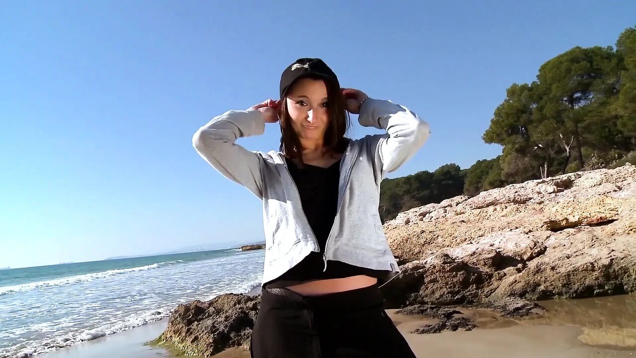 Brunette slut takes a hard cock on the beach