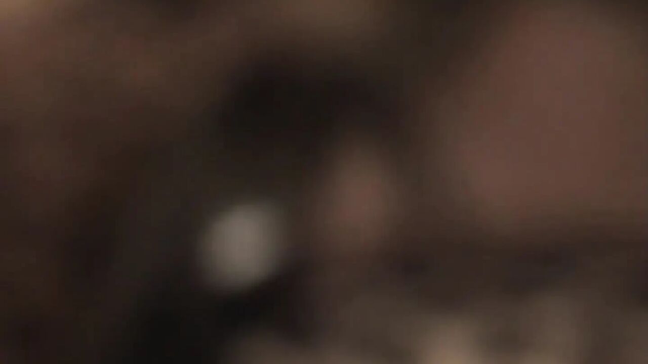 Cute brunette in black lingerie gets cum on her face
