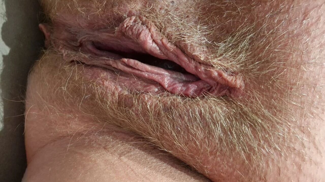 Wet slowly stroking in close-up