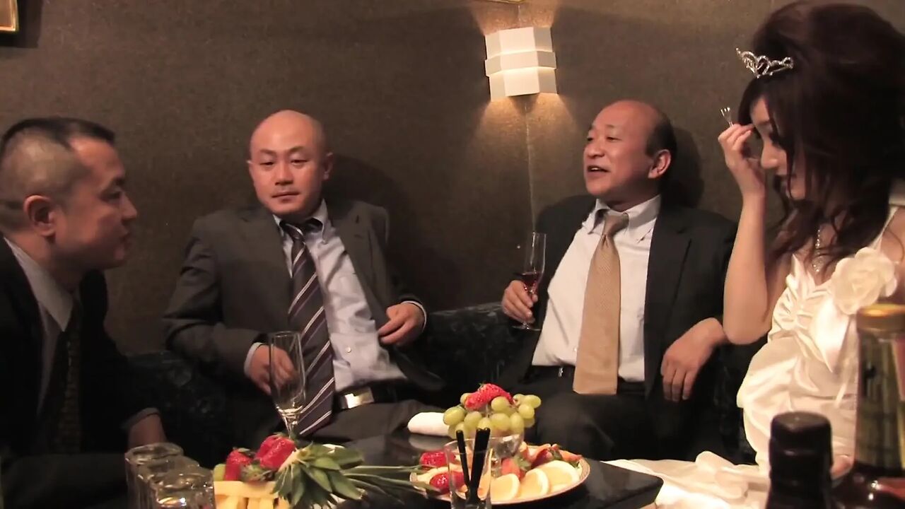 Cute Japanese Slut Servicing Three Guys in the Club
