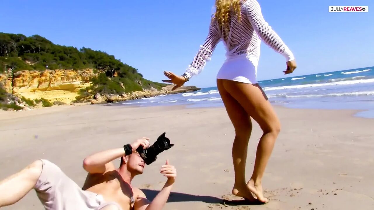 Sexy blonde rides a huge cock on the beach to a cumshot