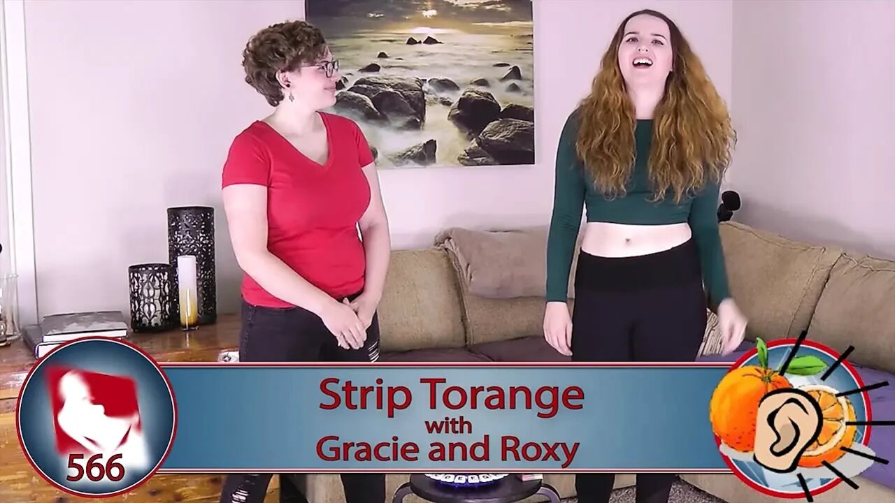 The girls take turns naming items until one falters, losing a piece of clothing