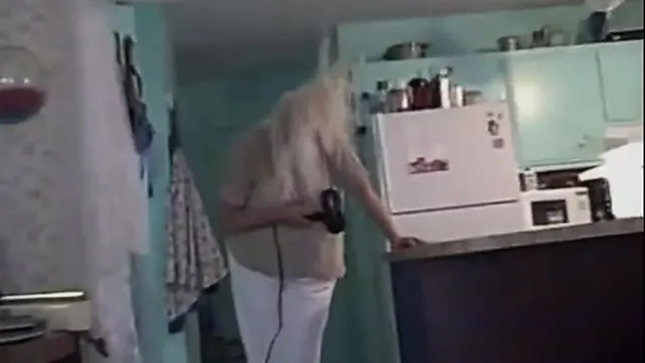 Granny blows her hair