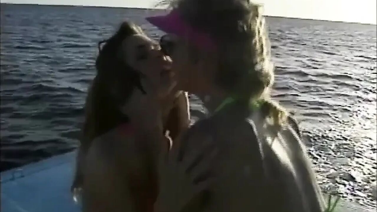 Lesbians pussy licking fingering on the beach