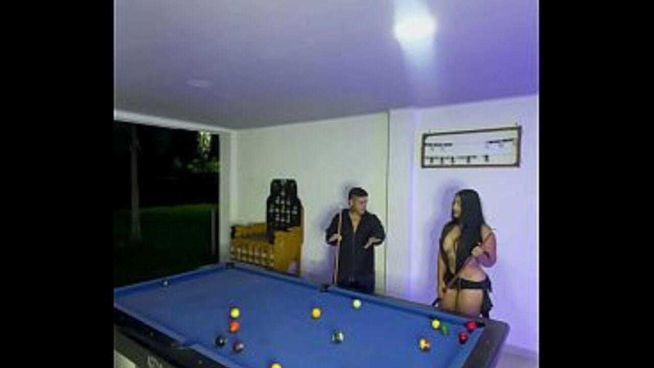 A college girl is fucked after a game of pool while her boyfriend is away.