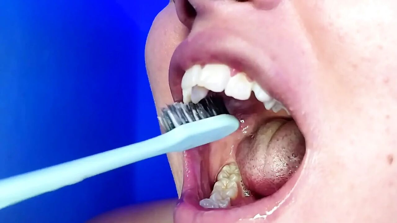 Brushing My Teeth and Showing You My Teeth (close-up)