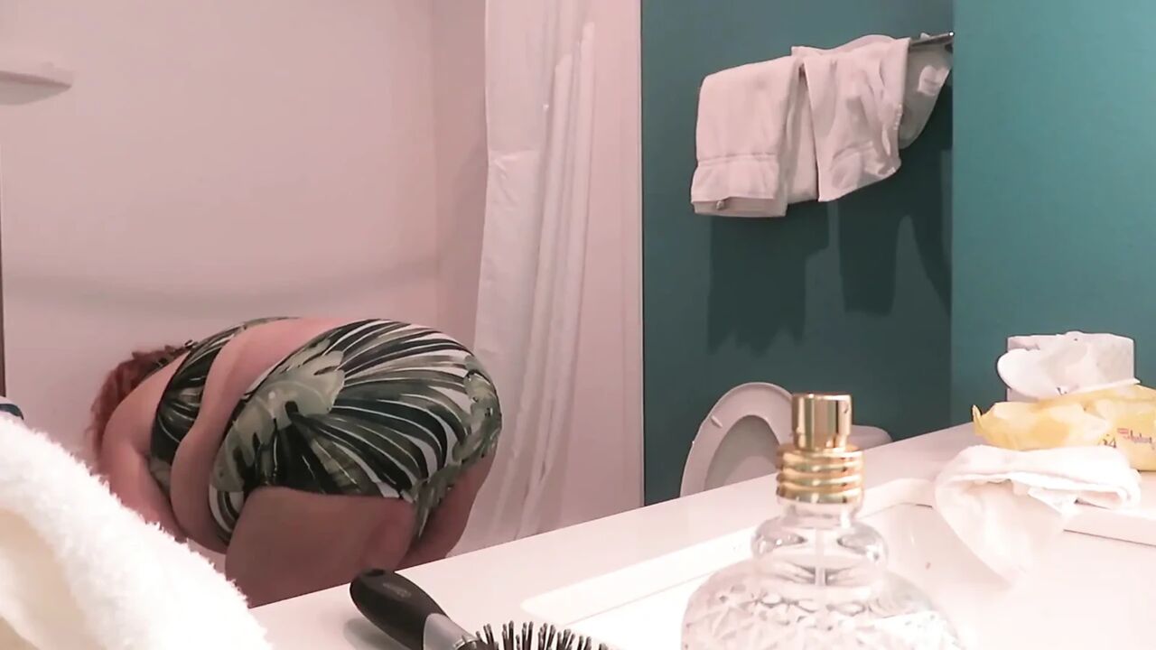 BBW nurse Vicki strips out of new 2 piece bikini set