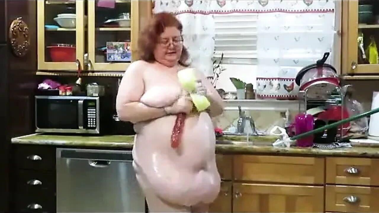 BBW nurse vicki wiping up the wet soapy floor then playing with a huge dildo and sponge while talking to the naughty boys