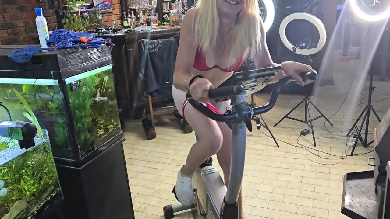 Cute 19 Year Old Blonde Riding Excersize Bike with Massive Dildo