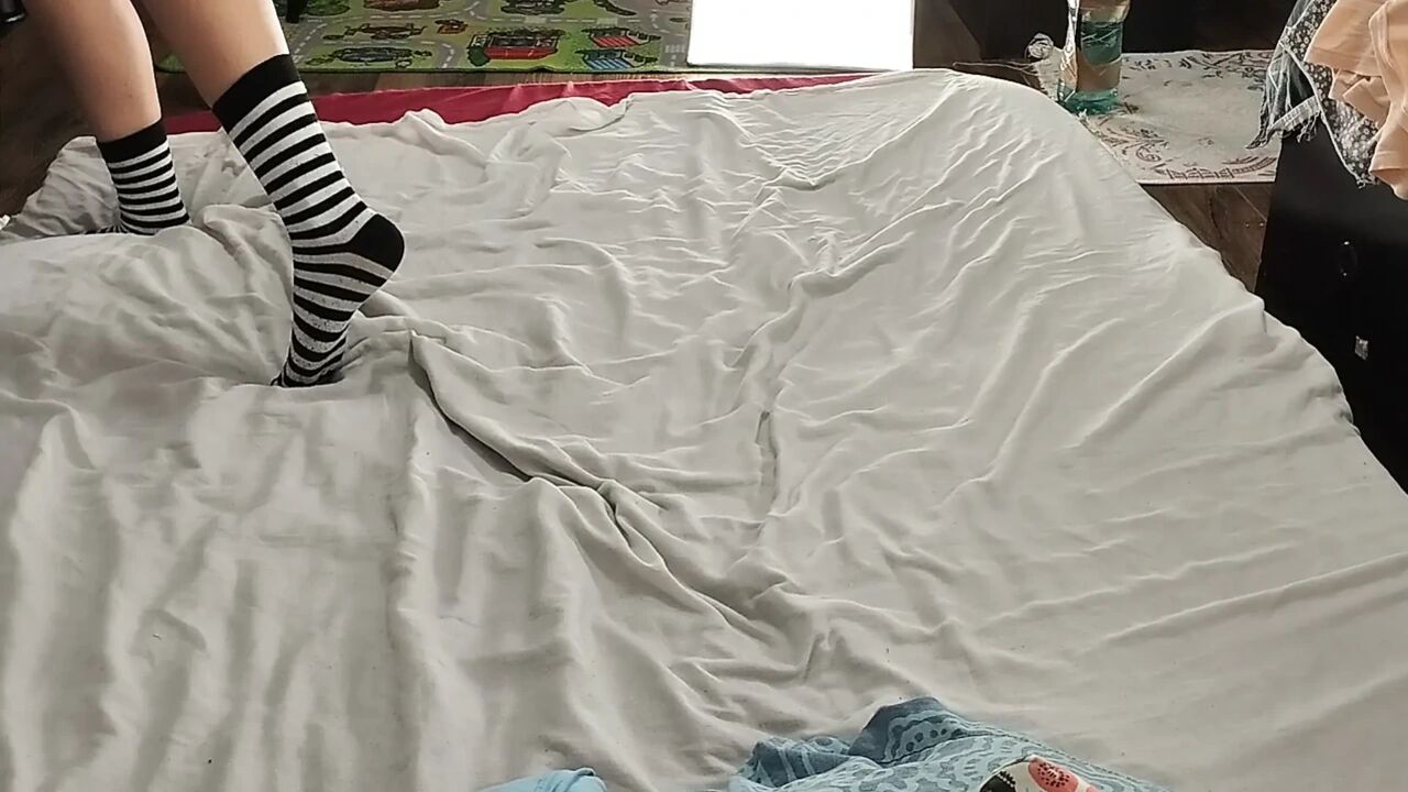 Sexy brunette doing naked chores around the house.