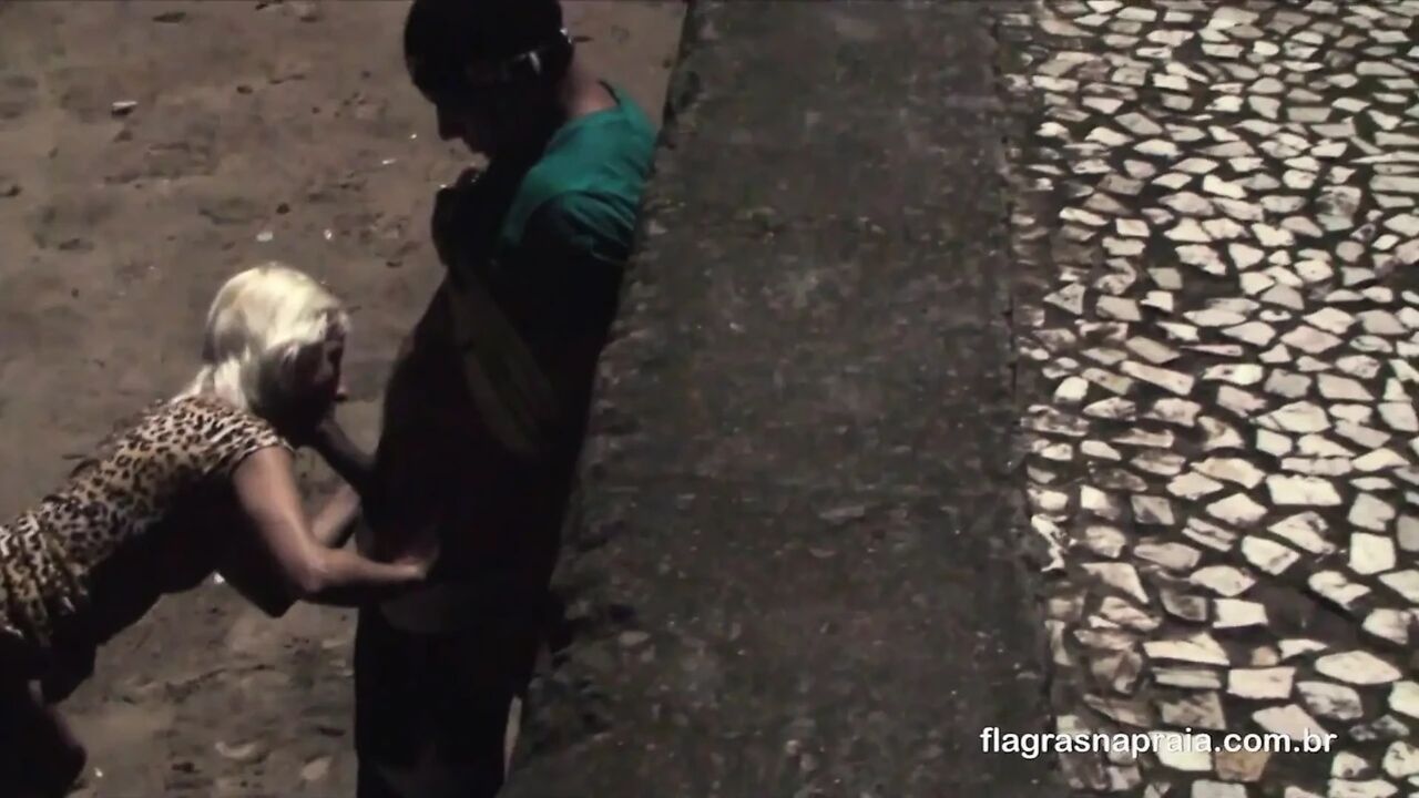 Couple fucking at night on the beach sand