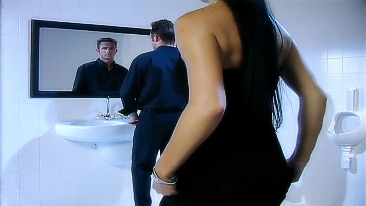 Milf with big tits gets ass fucked in double penetration in men's toilets