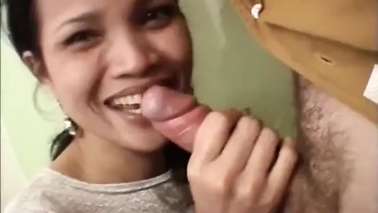 Ebony bitch blowing white cock