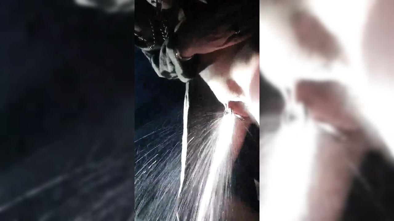 Squirt in the dark on parking lot