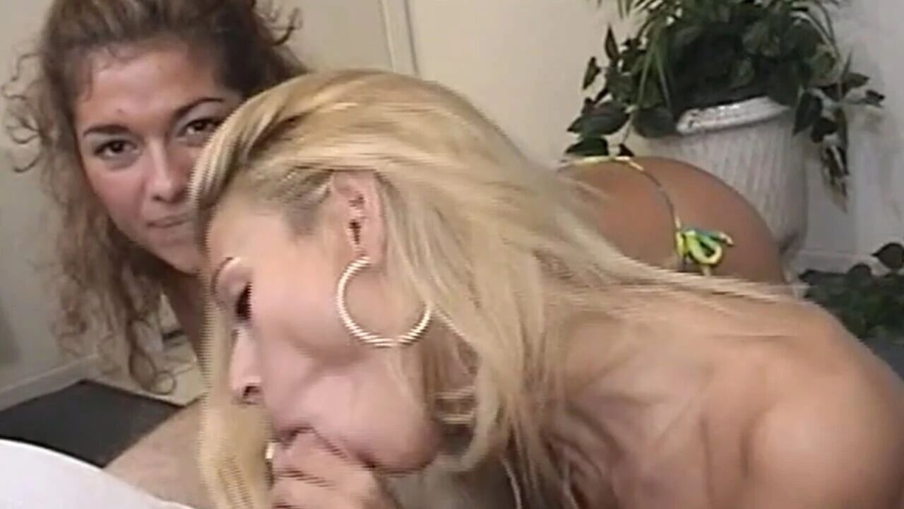 Two slutty babes sharing a small dick blowjob